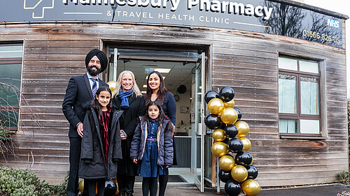 Roz Savage MP with family at Malmesbury Pharmacy